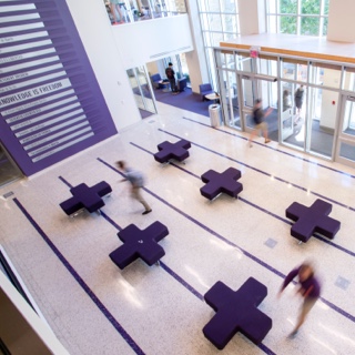 The lobby of Ӱɴý's Rees-Jones Hall features purple modular furnishings