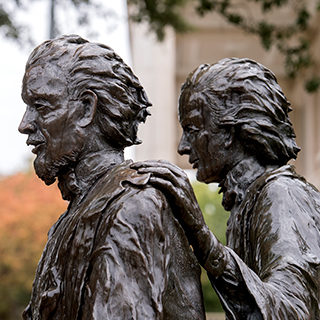 A bronze statue of Ӱɴý founders Addison and Randolph Clark